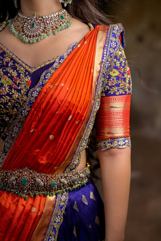Blue Paithani Lehenga with hand embroidered blouse and Orange Pattu Dupatta