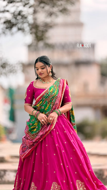 Rawsilk handwork Lehenga and blouse paired with pure payola Dhupatta