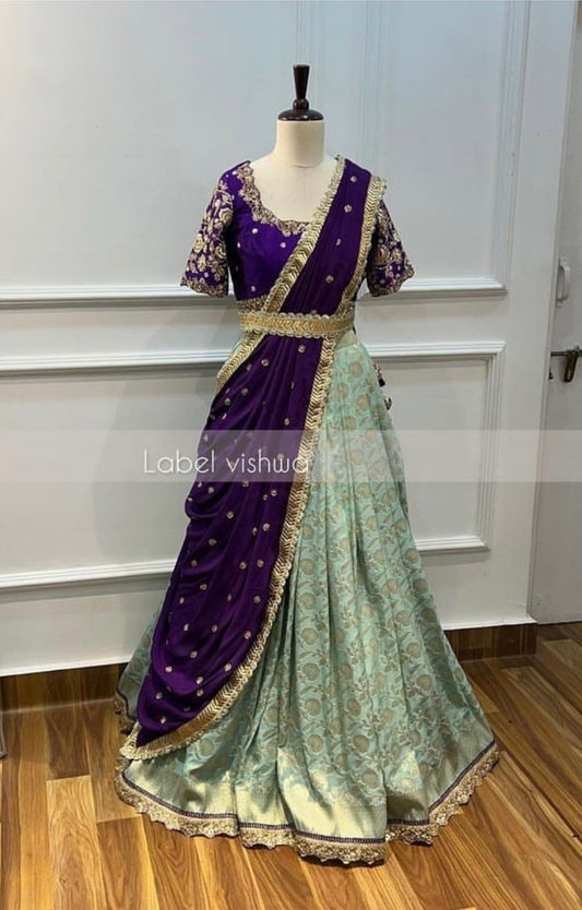 Flowy Banarasi Silk Lehenga with Raw Silk Maggam Work Blouse & Chinon Dupatta