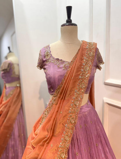 Lavender lehanga and blouse with
Peach dupatta