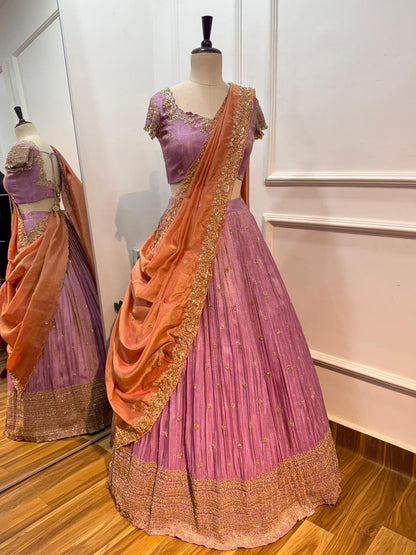 Lavender lehanga and blouse with
Peach dupatta