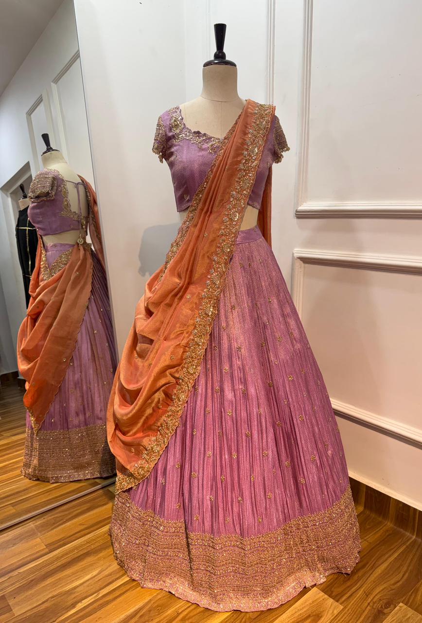 Lavender lehanga and blouse with
Peach dupatta
