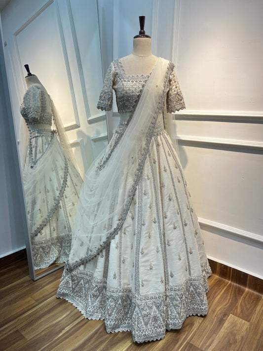 Ivory Raw Silk Lehenga with Hand Embroidery