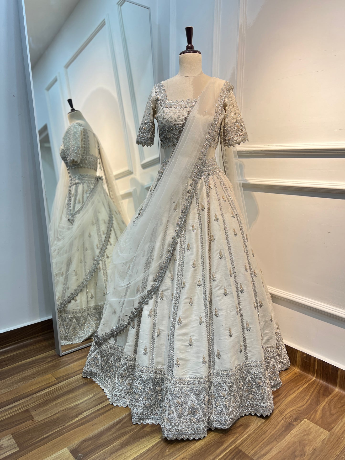 Ivory Raw Silk Lehenga with Hand Embroidery