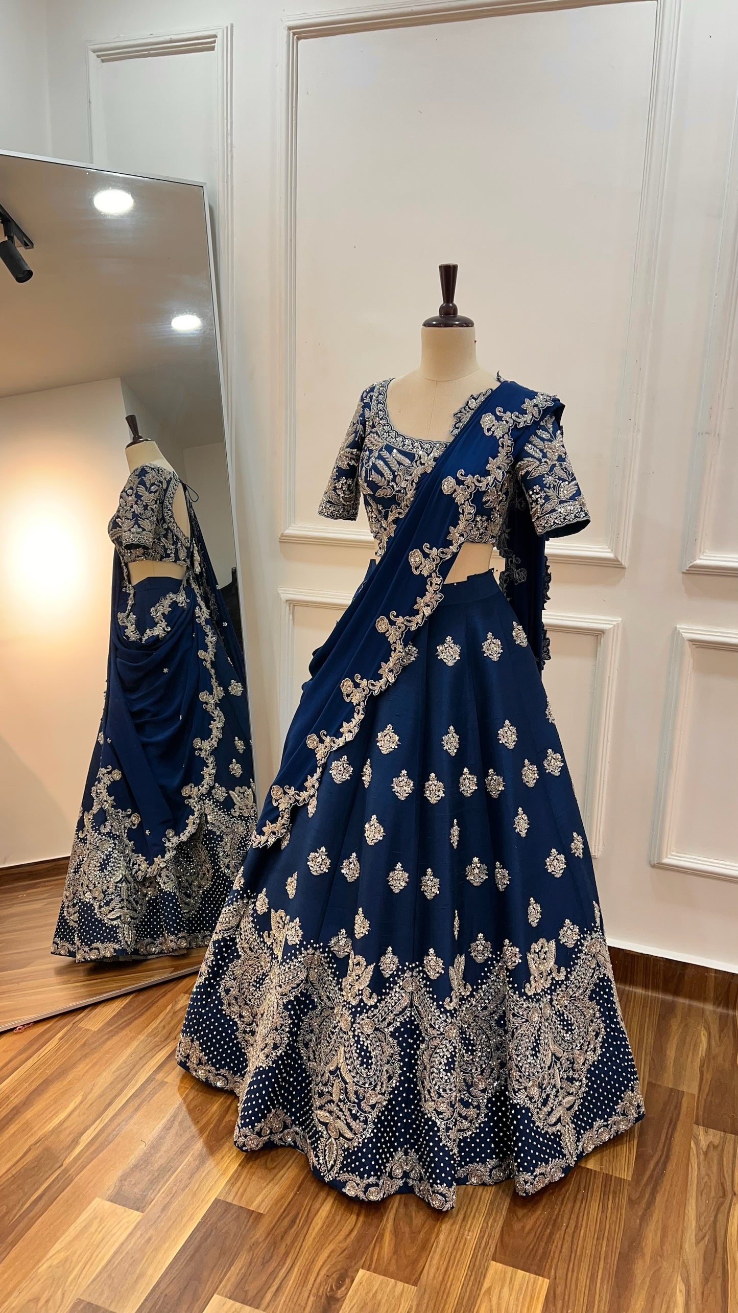 Blue hand embroidered raw silk lehenga