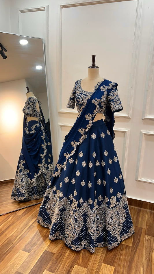Blue hand embroidered raw silk lehenga