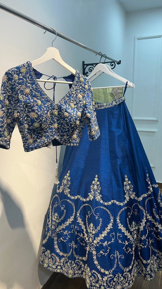 Navy Blue Raw Silk Lehenga with hand embroidered blouse and pastel Green Dupatta