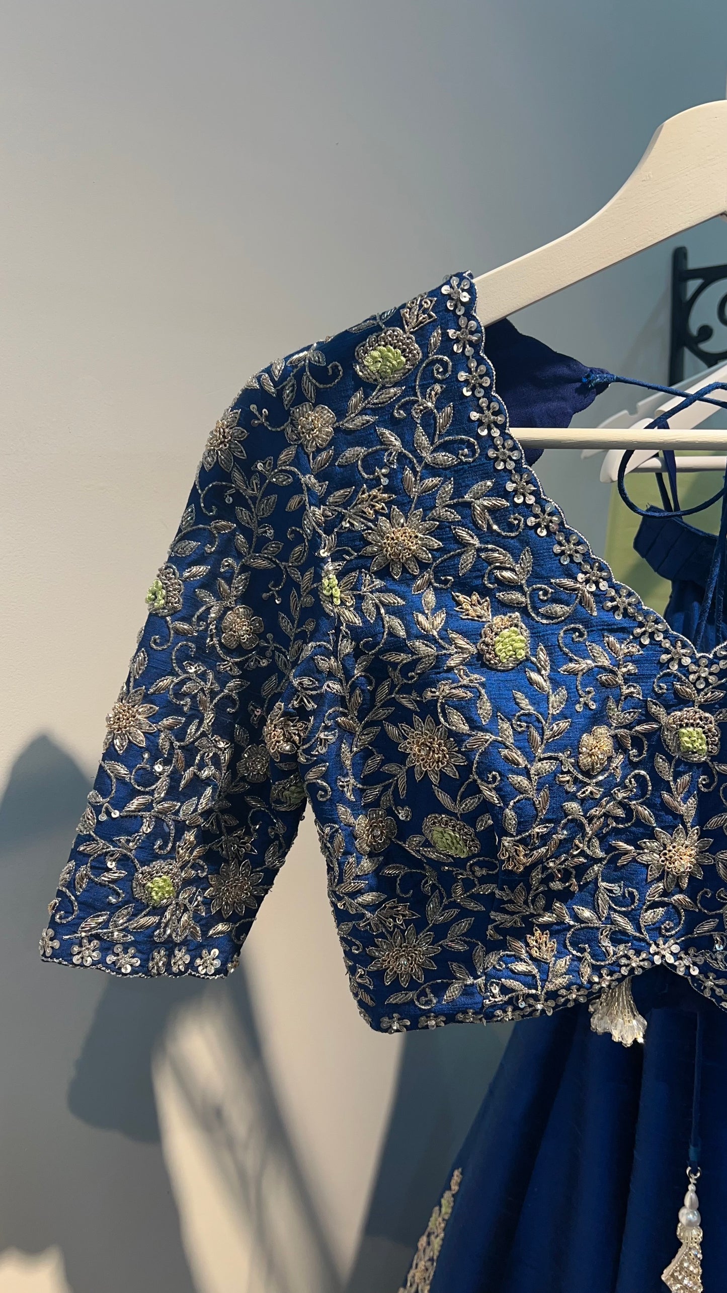 Navy Blue Raw Silk Lehenga with hand embroidered blouse and pastel Green Dupatta