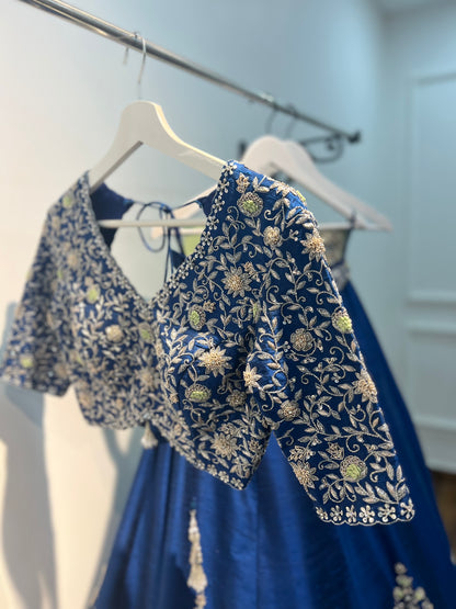 Navy Blue Raw Silk Lehenga with hand embroidered blouse and pastel Green Dupatta