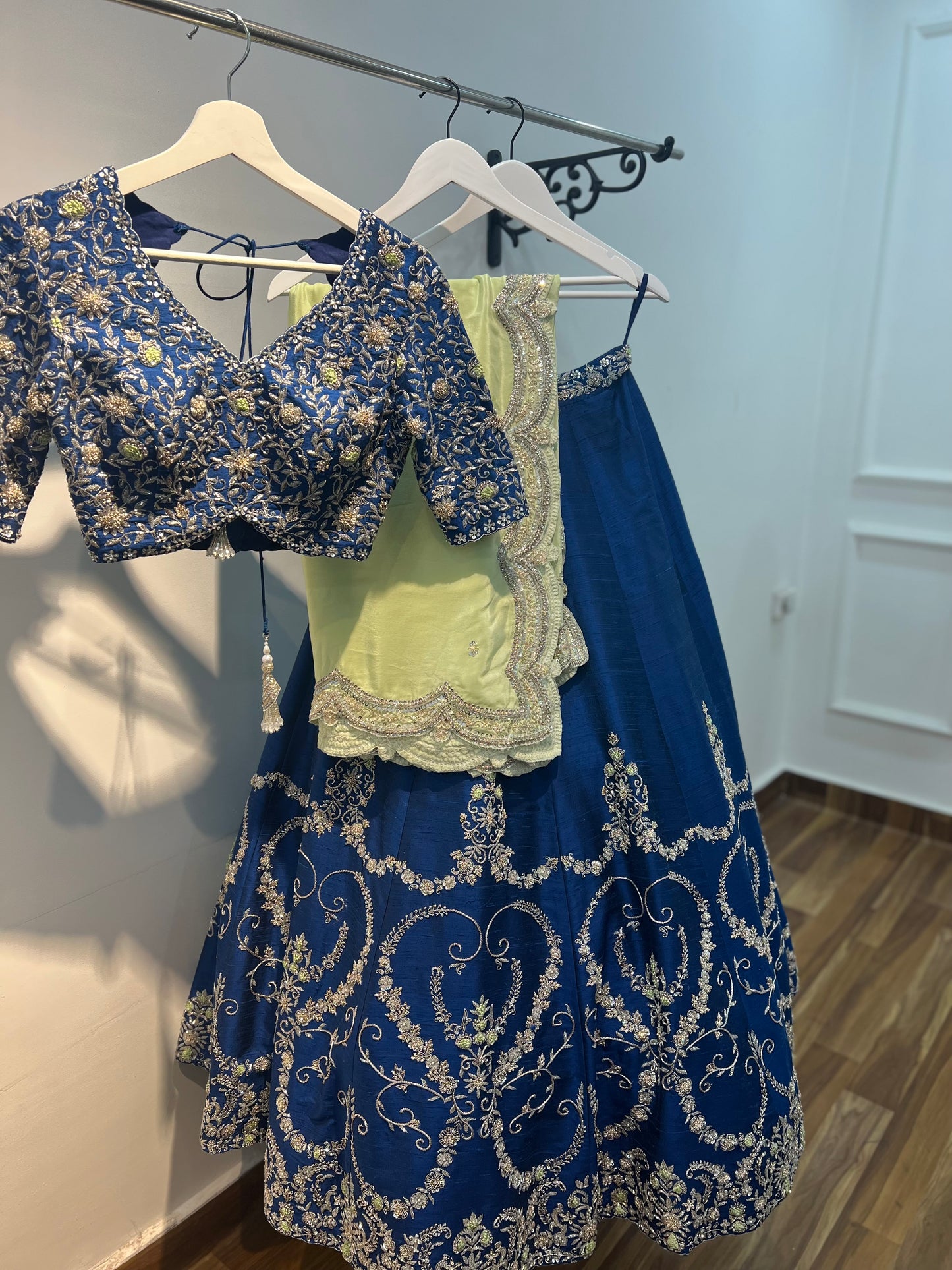 Navy Blue Raw Silk Lehenga with hand embroidered blouse and pastel Green Dupatta