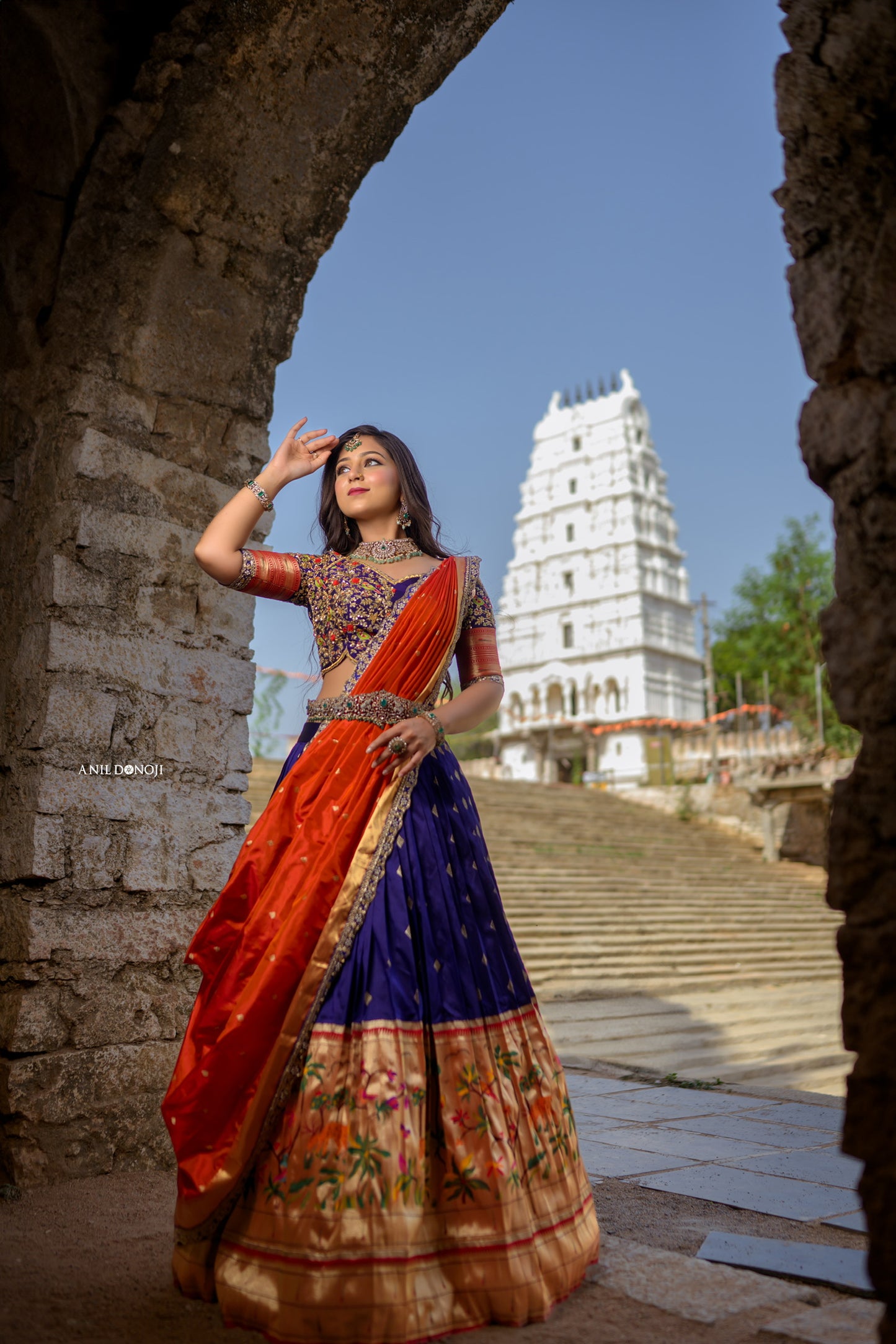 Blue Paithani Lehenga with hand embroidered blouse and Orange Pattu Dupatta