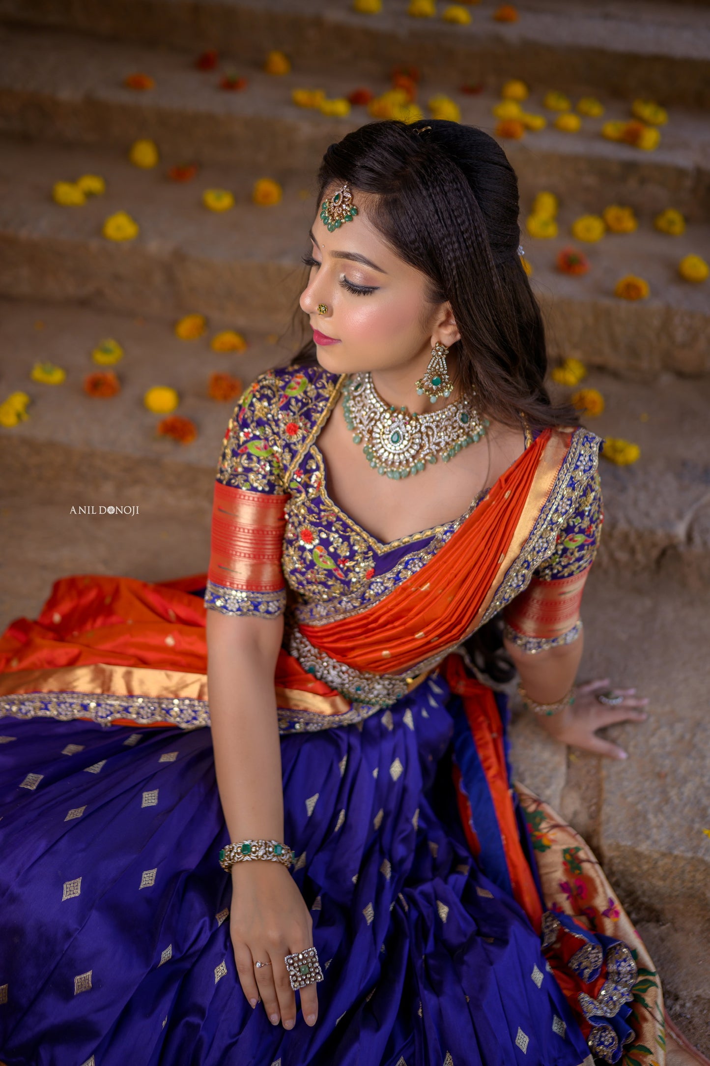 Blue Paithani Lehenga with hand embroidered blouse and Orange Pattu Dupatta