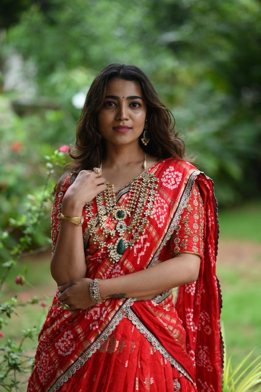 Red Banaras Lehanga paired With Gajji silk bandini Dupatta and hand embroidery blouse