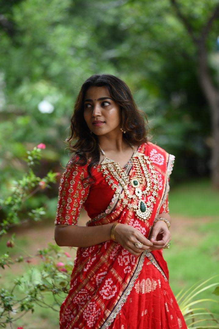 Red Banaras Lehanga paired With Gajji silk bandini Dupatta and hand embroidery blouse
