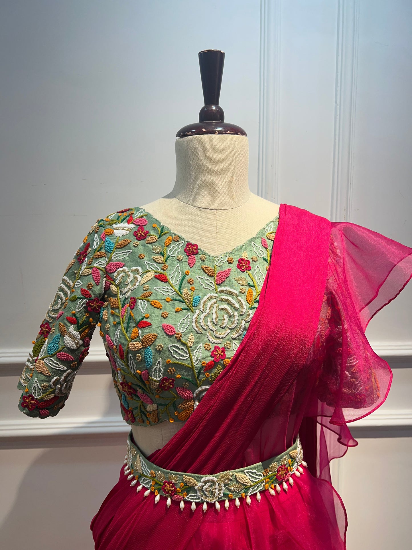 Pink pre draped ruffle saree with hand embroidery blouse