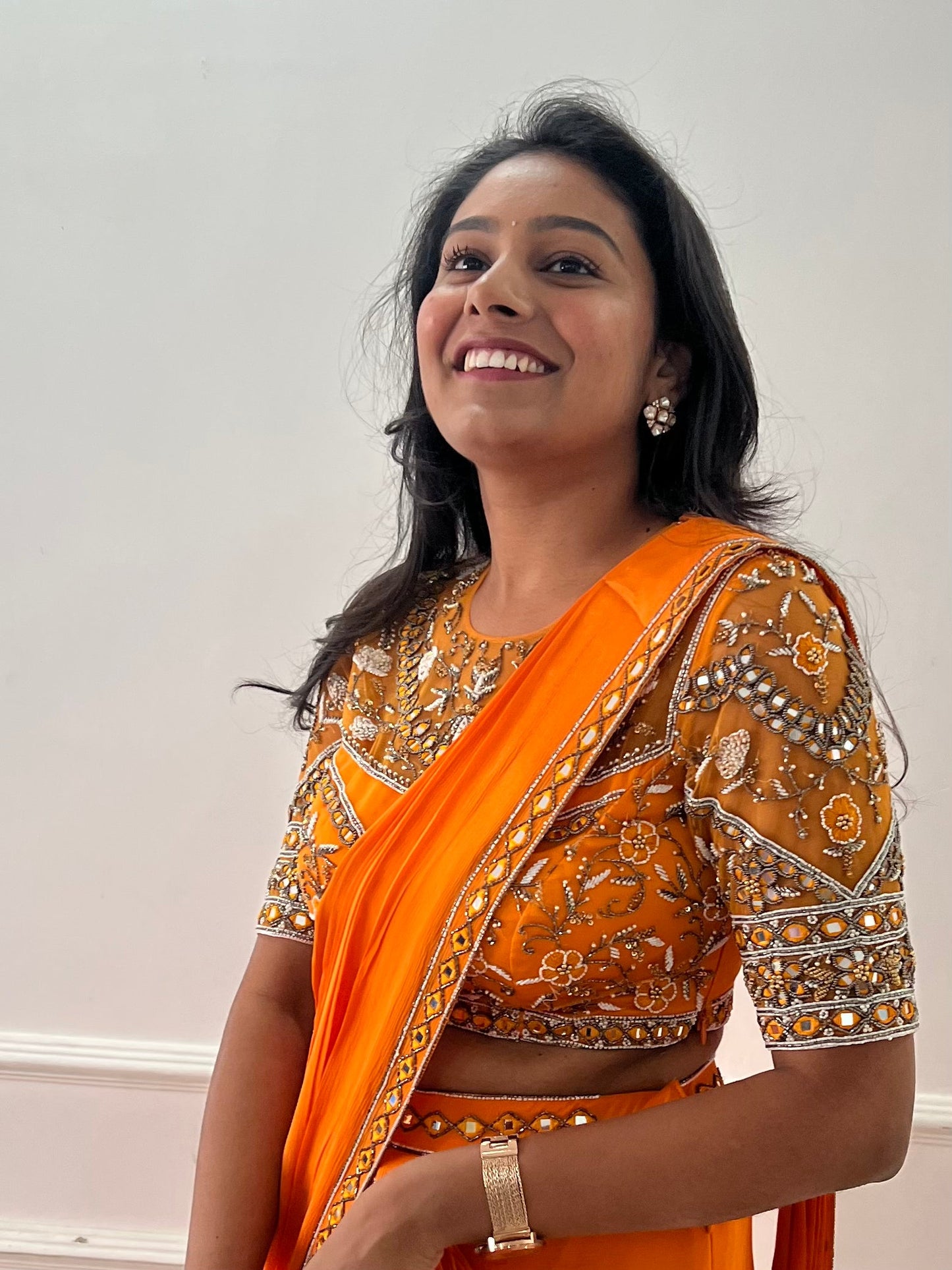 Orange pre draped ruffle saree with hand embroidery blouse