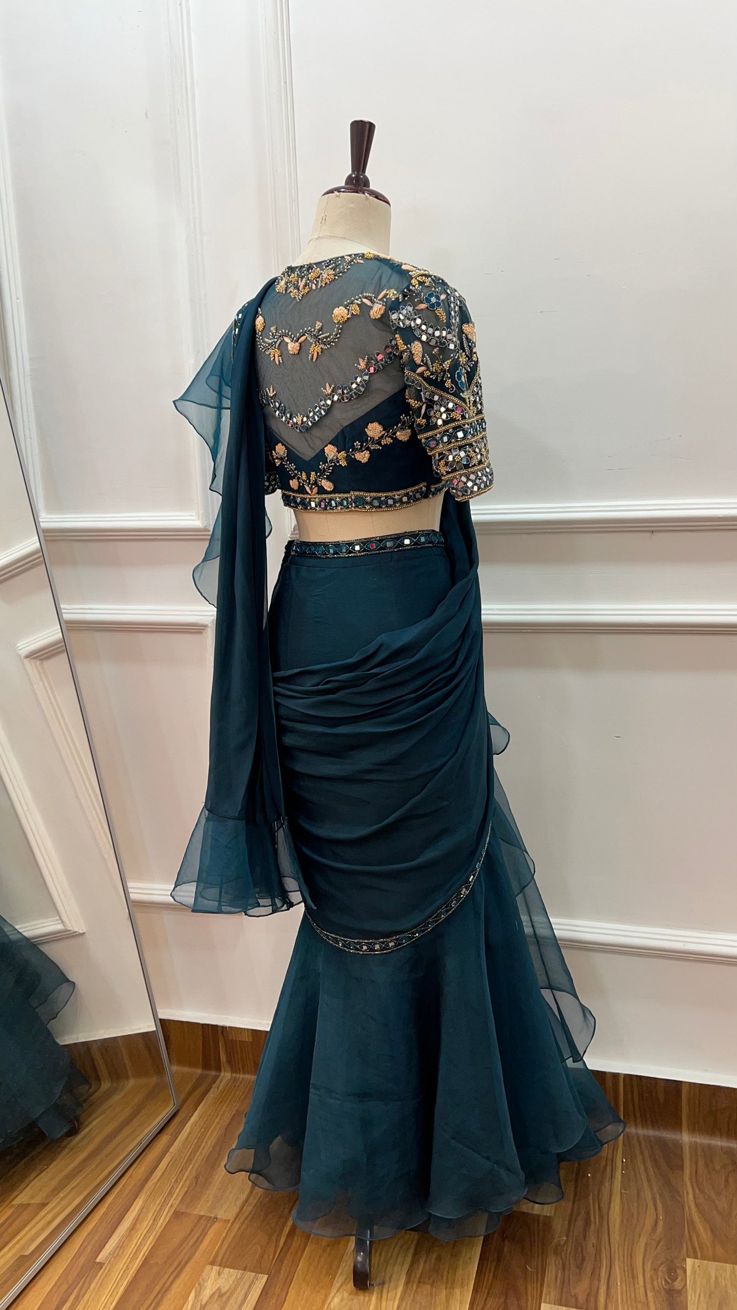 Teal Green pre draped ruffle saree with hand embroidery blouse