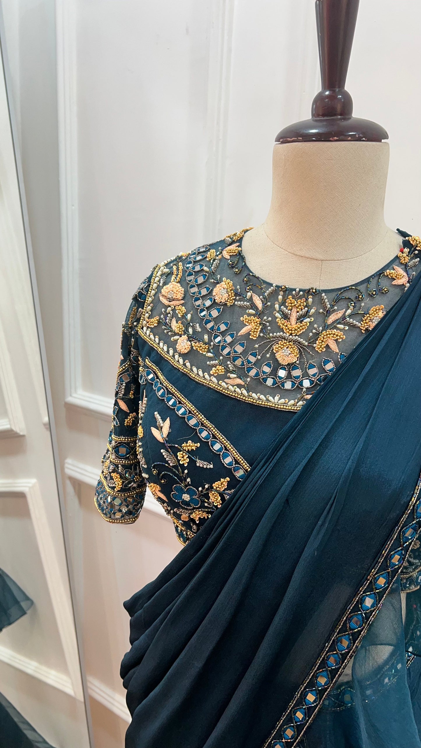 Teal Green pre draped ruffle saree with hand embroidery blouse