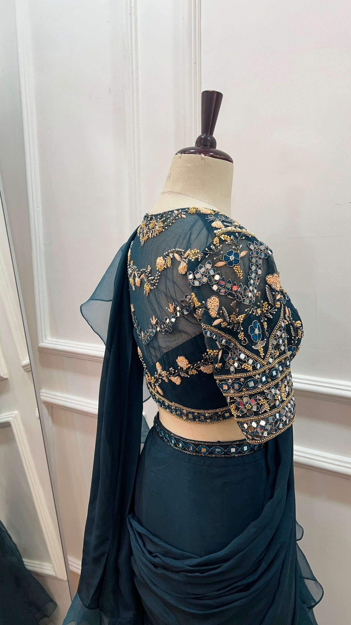 Teal Green pre draped ruffle saree with hand embroidery blouse
