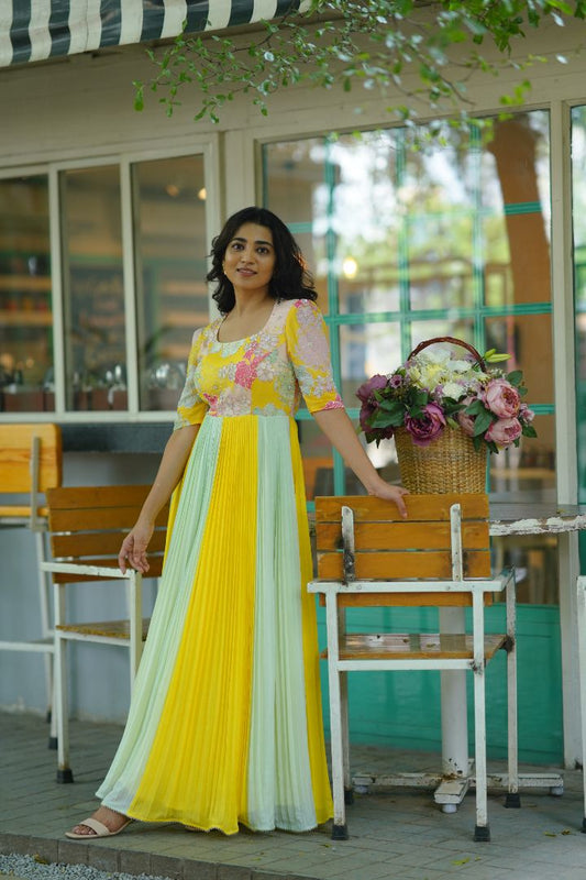 Yellow long frock with hand embroidery