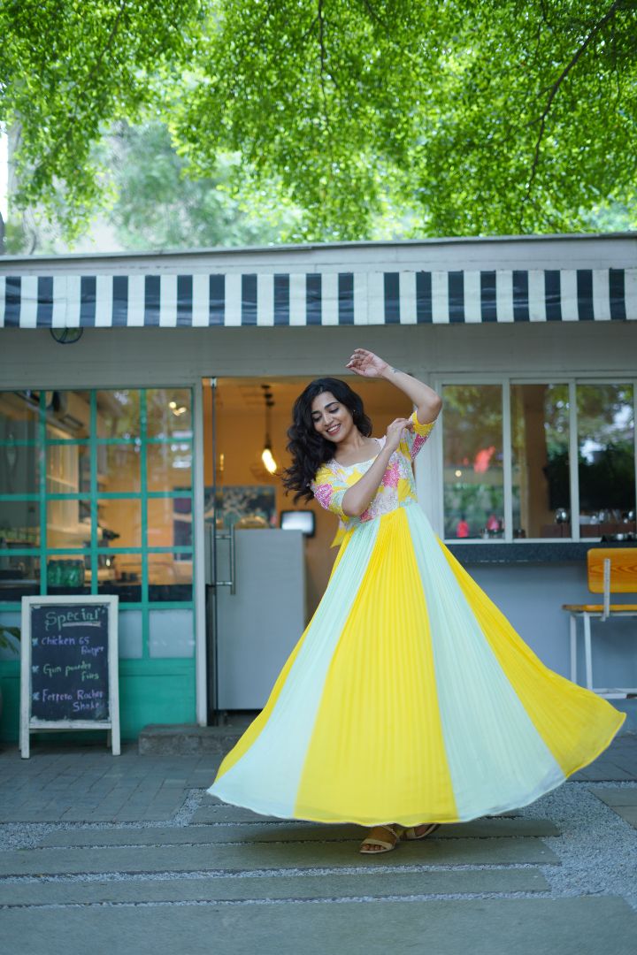 Yellow long frock with hand embroidery